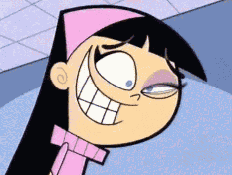A cartoon girl with black hair wearing a pink bandana and a pink
turtlenck sweater. She's smiling a huge smile, but her left eye is
twitching.